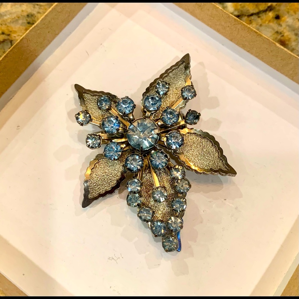 Antique light blue flower brooch